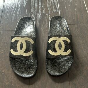 Slides with cricket like patch for non authentic Chanel